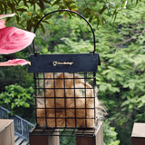 PawSwing Cat Hair Suet Collector filled with cat fur, designed for eco-friendly bird nesting material.