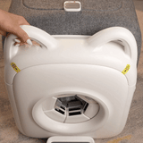 Close-up of the PawSwing AutoComb Pro with handles for easy lifting, designed for effortless cat grooming.