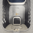 Top view of PawSwing AutoComb Pro inside a clean, spacious grooming area with anti-slip mat and feeding treats.